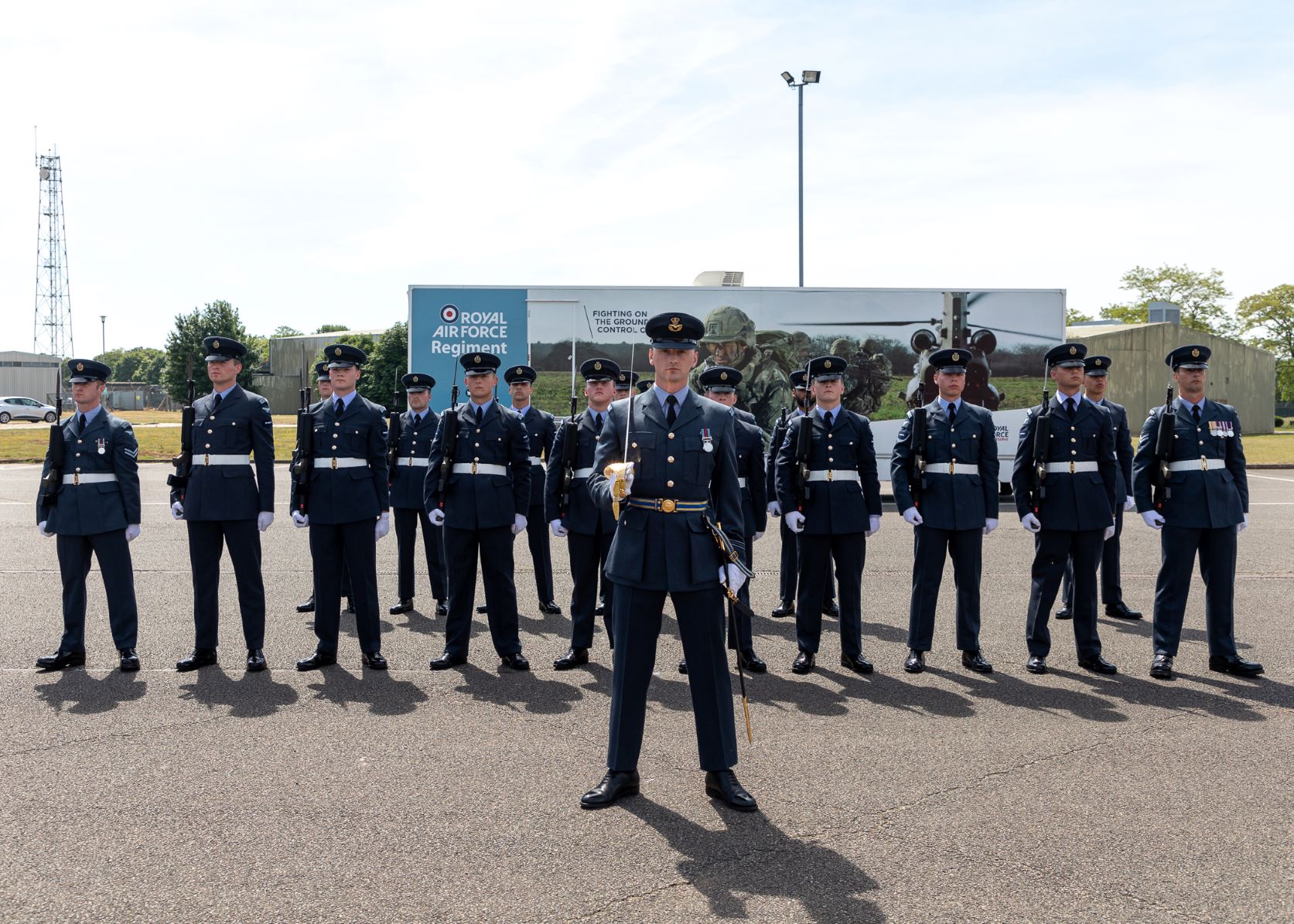 Flight stands in formation during parade.